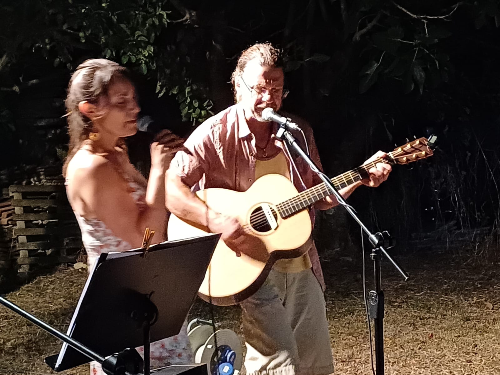 Perla and Kevin performing outdoors